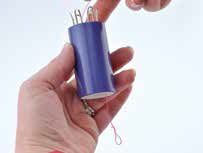 Wire being inserted into knitter